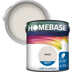 a white paint can with the words homebasee on it and an image of a rainbow