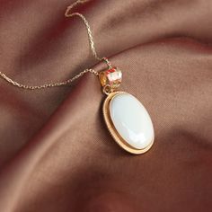 "Real Mother of Pearl Necklace 14k Gold Raw White Nacre Oval Necklace Vintage Style Boho Necklace Handmade Jewelry Christmas Gift For Women ▶ 𝙋𝙍𝙊𝘿𝙐𝘾𝙏 𝙁𝙀𝘼𝙏𝙐𝙍𝙀𝙎 * 14k Yellow Gold Mother of Pearl Necklace * Mother of Pearl Width : 1.23 cm ( 0.48 in) * Mother of Pearl Lenght : 1.75 cm ( 0.68 in) * Mother of Pearl Necklace Total Size : 1.55 cm x 2.38 cm ( 0.61 x 0.93 in) * Mother of Pearl Necklace Height: 4.95 mm ( 0.19 in) * Available in 5 different chain lengths: 42cm (16.5 in), 44cm Fine Jewelry Oval Necklace With Pearl Pendant, Elegant White Oval Cabochon Necklace, Gold Oval Pendant Necklaces With Cabochon, Gold Necklaces With Oval Pendant Cabochon, Gold Necklaces With Oval Cabochon Pendant, Oval Mother Of Pearl Gemstone Jewelry, Gold Oval Pendant Necklace With Cabochon, Oval Gold Necklaces As A Gift For Her, Classic White Oval Pendant Jewelry