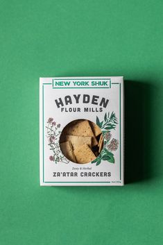 a box of new york shuk's hayden flour cookies on a green background