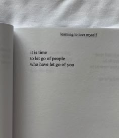 an open book with the words learning to love yourself