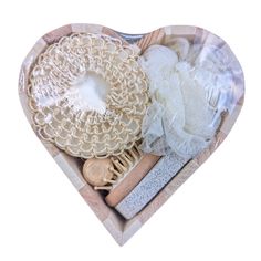 Our Heart-Shaped Wooden Spa Bath Gift Set is designed to pamper and rejuvenate your body and soul with a touch of natural elegance. This environmentally friendly set is thoughtfully packaged in a charming wooden heart-shaped box, perfect for gifting or indulging. Key Features: Natural and Environmentally Friendly:** Embrace eco-luxury with our spa set, crafted from natural materials and presented in an eco-friendly wooden heart-shaped box. This set not only nurtures your skin but also cares for the planet. Complete Spa Experience:** This set includes a variety of spa essentials to enhance your bathing routine. A sisal ball and scrunchie sponge provide gentle exfoliation, removing dead skin cells and promoting healthy, glowing skin. The natural bristle brush is perfect for dry brushing, sti Bathing Routine, Bath Gift Set, Eco Luxury, Spa Set, Bath Gift, Spa Essentials, Bristle Brush, Bath Spa, Wooden Heart