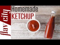 a bottle of ketchup next to a bowl of ketchup