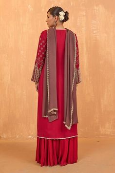 Ruby red full sleeves A-line kurta with Mughlai bloom embroidery using sequin-pearl highlights. Paired with a flared palazzo and a border embroidered taupe brown dupatta. - Aza Fashions Anarkali Kurta For Fall Festive Occasions, Festive Fall Anarkali Kurta, Semi-stitched Long Sleeve Palazzo Set With Dupatta, Festive Long Sleeve Traditional Wear For Fall, Long Sleeve Red Dresses With Cutdana Details, Unstitched Long Sleeve Kurta For Fall, Unstitched Long Sleeve Sets For Fall, Long Sleeve Kurta With Pallu For Winter, Long Sleeve Self Design Palazzo Set For Festive Occasions