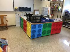 a room with several different colored blocks on the floor