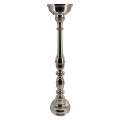 a metal candle holder on a white background