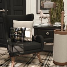 a living room filled with black furniture and pillows on top of plaid flooring next to a tall wooden coffee table