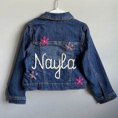 Add this adorable jean jacket to your little girl's wardrobe today! There is nothing more special than adding some fun to her wardrobe with a personalized look. Choose her favorite colors or favorite design to specialize it to her! Perfect for any season, layering, or just an adorable accessory.  Jackets fit true to size from the brand The Children's Place. Cute Medium Wash Denim Jacket For Spring, Customizable Spring Denim Jacket, Spring Customizable Denim Jacket, Customizable Denim Jacket For Spring, Customizable Long Sleeve Denim Jacket For Spring, Customizable Denim Outerwear For Spring, Pink Embroidered Cotton Denim Jacket, Customizable Trendy Denim Jacket For Spring, Trendy Customizable Spring Denim Jacket