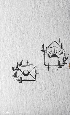 a drawing of two envelopes on a piece of paper, one with a clock and the other with leaves