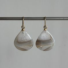 Rose cut diamonds top the peaks of these mountainous Botswana agate drops. 18k yellow gold Botswana agates, 24.77ctw, 20mm x 22mm (13/16" x 7/8") Diamonds, 0.32ctw, 3mm in diameterEarrings hang 1 7/16" from the ear Each earring weighs 3.1g Diamond Top, Botswana Agate, Newport Ri, Rose Cut Diamond, Botswana, Teardrop Earrings, Rose Cut, Newport, Diamond Cuts