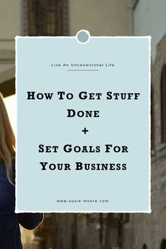 a woman standing in front of a building with the words how to get stuff done and set goals for your business