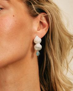 Showstopping sterling silver aquamarine shell earrings. These statement earrings will have everyone complimenting your unique style! They are perfect for the boho beach lover looking to embrace mermaid vibes or for the girl who loves unique jewelery that speaks volumes! Aquamarine can represent hope, happiness and emotions. It also connects us to the wisdom of water and the moon.Material: Genuine Sterling Silver 92.5Gemstone: AquamarineGemstone size: 8mmLength/wide: 40mmCondition: Brand new Bohemian Summer Jewelry In Ocean Color, Summer Bohemian Blue Jewelry, Summer Bohemian Ocean Color Jewelry, Summer Bohemian Style Blue Jewelry, Ocean-inspired Jewelry For Summer, Summer Ocean-inspired Jewelry In Ocean Color, Silver Shell-shaped Earrings For Summer, Silver Shell Drop Earrings, Ocean-inspired Shell Jewelry With Matching Earrings