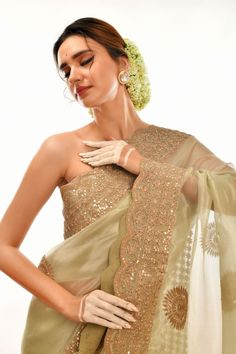 Add a subtle sophistication to your wardrobe with these timeless Sage Green hand-crafted Gotta Patti sarees. Crafted with precision and care, these sarees exude elegance, making them perfect for any occasion. Elegant Chanderi Pre-draped Saree With Zari Work, Elegant Cotton Silk Pre-draped Saree With Dupatta, Cotton Silk Pre-draped Saree With Mirror Work For Reception, Traditional Pista Green Organza Pre-draped Saree, Elegant Pre-draped Saree With Cutdana, Elegant Pre-draped Pista Green Saree With Sheer Dupatta, Elegant Cotton Silk Pre-draped Saree For Festivals, Elegant Unstitched Pre-draped Saree With Resham Embroidery, Traditional Pre-draped Organza Saree With Mirror Work