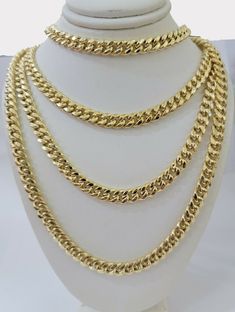 "10K YELLOW GOLD MIAMIC CUBAN CHAIN 7MM 24\" (INCHES) NECKLACE FOR MEN AND WOMEN, REAL 10KT GOLD 10 k Yellow Gold ( Real , Not plated , Not filled ) Miami Cuban link chain For men's . The Width of the necklace is 7 MM and 24 Inches Long. The Clasp is Box Lock. The chain is considered durable. The necklace is 100% guaranteed 10k yellow gold and have been professionally tested and stamped 10k for purity authenticity. We guarantee the purity of the gold to be 10k, and the chains are NOT GOLD PLATED Gold Link Necklace, Miami Cuban Link Chain, Miami Cuban Link, Gold Rope Chains, Miami Cuban, Gold Link, Necklace For Men, Cuban Link Chain, Cuban Chain