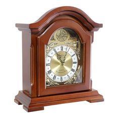 a wooden clock with roman numerals on the front and sides, set against a white background