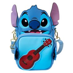 Camp out on the shores of the great outdoors with the Loungefly Stitch Camping Cuties CROSSBUDDIES™ Bag. On the front, Stitch takes shape with applique ears and embroidered facial features. Down below, he holds a ukulele on a detachable coin bag. Unclasp his arms to change the coin bag’s reversible design to a frog! This bag is an officially licensed Disney product. Dimensions: 6.25”W x 8.25”H x 2.25”D Material: Faux leather (polyurethane) Features: Bag has adjustable (detachable) shoulder strap, detachable and reversable coin bag, and shiny gold hardware. Additional features include applique, embroidered, and printed details. Relaxing Evening, Idolmaster Cinderella Girls, Gaming Merch, A Frog, Dark Horse Comics, Loungefly Disney, Ghost In The Shell, Lilo Stitch, Ukelele