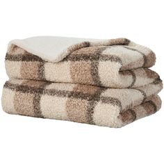 two towels stacked on top of each other in brown and white checkerboard pattern