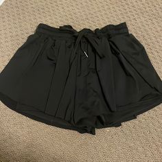 Black Flowy Butterfly Shorts Built In Shorts Never Worn Black Pants With Built-in Shorts For Summer, Black Elastic Waistband Bottoms, Short Length, Black Bottoms With Elastic Waistband For Spring, Spring Black Bottoms With Elastic Waistband, High Waist Black Bottoms With Elastic Waistband, Black Short Leg Pants For Spring, Stretch Black Bottoms For Day Out, Black Bottoms With Built-in Shorts For Summer, Black Stretch Bottoms For Day Out