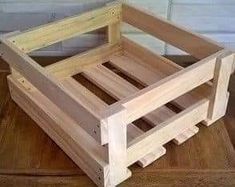 a wooden crate sitting on top of a table