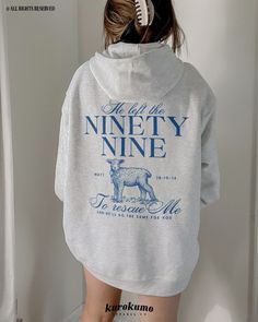 This Unisex hooded sweatshirt features "He left the ninety-nine to rescue me | and He'll do the same for you | Matt. 18:10-14" with a cute vintage lamb illustration on the back and front pocket side. Spread God's love and the gospel with this coquette-style Christian sweater <3 Make sure to check out the other garment options below :) » O P T I O N S « ‣ Tshirt: https://www.etsy.com/listing/1716679452 ‣ Crewneck: https://www.etsy.com/listing/1672124614 » A B O U T « ‣ This item is made to order using direct-to-garment (DTG) printing technology. This digital process involves the printer inks being jetted or sprayed onto the textile by a print head after the garment goes through a pre-treatment machine to create a stronger bond between garment fibers and the pigmented inks. ‣ This is NOT scr Christian Hoodies Aesthetic, He Left The 99 To Find Me, Christian Sweatshirt Designs, Lamb Illustration, Christian Sweater, Jesus Hoodies, Christian Sweatshirts, Vintage Lamb, Blue Coquette