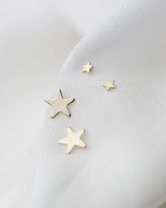 Tiny Star Earrings Lightest cute small star earrings. Wear it while showering, swimming all day, everyday E&E PROJECT 14k SOLID GOLD SERIES ------------------------------------------------------ 14k Gold Star Earrings Lightest cute small Star earrings. 5.5mm Star studs / 1 Pair with 14K gold backings --------------------------------------- ■ SHIPPING UPGRADES You can find shipping upgrades options in the drop bar menu when you check out. * Within the U.S Regular First-class : 2-6 business da Minimalist 14k Gold Star Charm Earrings, Minimalist 14k Gold Earrings With Star Charm, Minimalist Rose Gold Star Earrings, Minimalist Gold Earrings, Simple Studs, Gold Star Earrings, Minimalist Earrings Gold, Star Stud Earrings, Real Gold Jewelry