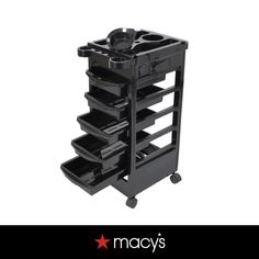 a black trolley with five trays on it and the words macy's above it