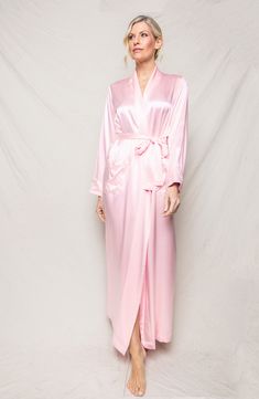 Exude elegance through your morning and nighttime routines in this luxurious robe sewn from fluid silk. Shawl collar Long sleeves Front patch pockets Removable tie belt 100% silk Dry clean Imported Pink Silk Robe, Silk Bathrobe, Silk Robe Long, Luxury Sleepwear, Classic Pajamas, Silk Dress Long, Silk Robe, Luxury Silk, Womens Robes