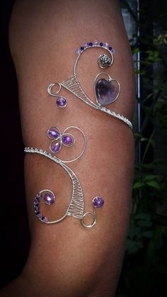 Amethyst heart Arm cuff,  Silver Wire Wrap Spiral Arm band, Arm cuff bracelet If you want to change the usual look, it's simple, put a upper arm bracelet! The  upper arm bracelet is an original jewelry. These handcrafted bracelet were made with Amethyst heart, silver plated wire and feature a sparkly Czech glass beads. The upper arm bracelet is universal: in any fullness will look perfect. He does not press and pulls your hand. You go all day and not to think about it - it is so comfortable. To Purple Cuff Bangle Bracelet As Gift, Handmade Adjustable Purple Cuff Bracelet, Amethyst Cuff Bracelet As Gift, Unique Purple Cuff Bracelet As Gift, Amethyst Cuff Bracelet In Purple For Gift, Unique Purple Cuff Bracelet For Gift, Purple Amethyst Cuff Bracelet Gift, Purple Wire Wrapped Bangle Jewelry, Adjustable Amethyst Cuff Bracelet Gift