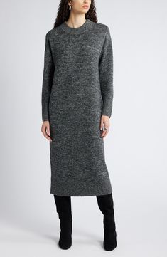 This long sweater-dress knit from marled merino-wool yarn is perfect for when you want to look put together but also want the relaxed coziness of your favorite pullover. Slips on over head Crewneck Long sleeves Dropped shoulders Ribbed cuffs and hem 100% merino wool Hand wash, dry flat Imported Knit Sweater Dress For Winter Workwear, Long Wool Sweater Dress For Fall, Winter Wool Sweater Dress For Work, Long Wool Sweater Dress For Winter, Wool Sweater Dress For Workwear In Winter, Winter Knit Midi Dress, Winter Knit Midi Dress For Work, Cozy Knit Sweater Dress Midi Length, Knitted Wool Sweater Dress For Fall