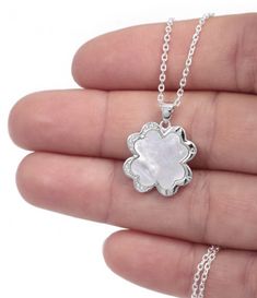 925 Sterling Silver Cable Chain with a dangling Mother of Pearl Clover Pendant. Frame of Clover is enhanced with beautiful with diamond stimulants. The Chain is secured by a Clasp Lock. Measurements Approximately Weight: 4.70 g / 0.17 oz Width: 18.00 mm / 0.71 in Height: 18.00 mm / 0.71 in Chain Length: 17.68 inch / 45cm Canoga Park, Clover Pendant, Sterling Silver Anklet, Clover Necklace, Blue Evil Eye, Silver Anklets, Gorgeous Bracelet, Cable Chain, Chain Lengths