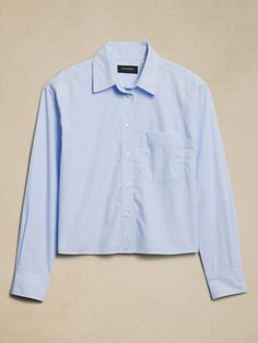 This shirt hits at the high hip and pairs effortlessly with mid to high waist jeans. Point collar. Long sleeves with button cuffs. Drop shoulders. Button front closure. Chest pocket. Back yoke with center box pleat. Straight hem. Made exclusively for Banana Republic Factory. #526940 High Hips, Banana Republic Factory, Waist Jeans, Box Pleats, High Waist Jeans, Chest Pocket, Drop Shoulder, Banana Republic, Button Downs