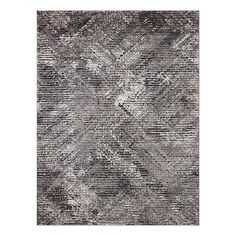 a gray rug with an abstract design on the top and bottom part of it,