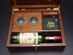 two bottles of wine in a wooden box