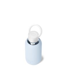 a light blue water bottle with a white lid on a white background thermos are not used