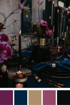 the table is set with candles, flowers and other things to be used for decoration