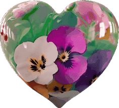 a glass heart with flowers painted on it