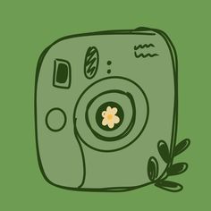 an old camera with a flower on the front and green back ground, surrounded by leaves