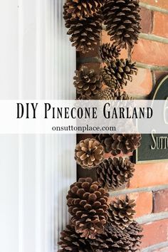 pinecone garland hanging on the side of a brick wall with text overlay that reads diy pine cone garland