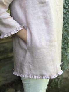 "Elegant linen tunic with decorative ruffles around the sleeves and bottom hem. Conservative neckline with a small button closure at the back. Unnoticeable pockets for your comfort in the side seams. Special look for your special moments. In the photos the tunic is made from 'Dusty Pink' colored linen. Made from 100% pure European linen in medium weight this tunic is light and comfortable. Choose from various linen colors. The tunic will be custom made for you within 10 days with great attention Linen Tunics For Women, Breastfeeding Dress, Womens Wrap Dress, Linen Top Women, Linen Tunic Dress, Linen Tunic Tops, Bias Cut Skirt, Ruffled Tunic, Linen Scarves