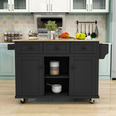 a black kitchen island with lots of food on it