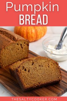 two slices of pumpkin bread on a cutting board