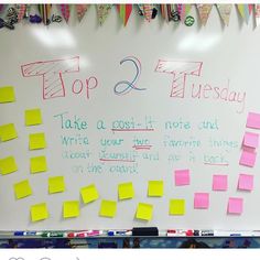 a white board with post it notes and writing on it that says top 2 tuesday