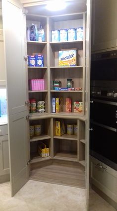 an open pantry with lots of food in it