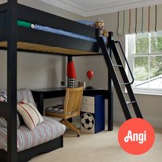 there is a bunk bed with a ladder in the corner and a soccer ball on the floor