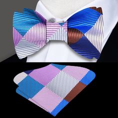 This silk bow tie features a striking geometric diamonds pattern in blue, purple, grey, and pink, offering a stylish mix of colors that adds personality to formal or semi-formal outfits. The intricate design and vibrant color palette create a modern and refined look. Dress Shirts: White dress shirt: A clean and neutral choice that allows the bow tie's bold colors and geometric pattern to take center stage. Light grey dress shirt: This subtle background enhances the grey elements of the bow tie w Grey Dress Shirt, Pocket Square Pattern, Subtle Background, Semi Formal Outfits, Light Grey Dress, Geometric Diamond Pattern, Tie Matching, Grey Shirt Dress, Stage Light