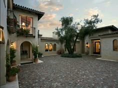 an outside view of a home at dusk