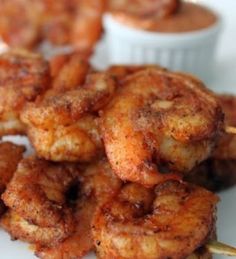 some fried food is on a white plate