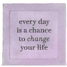 an embroidered blanket with the words, every day is a chance to change your life