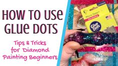 a hand holding a purple glitter dot in front of a bag with the words how to use glue dots tips & tricks for diamond painting beginners