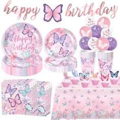 a birthday party set up with pink and purple decorations, plates, cupcakes, napkins and cups