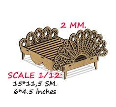 a wooden model of a bed with intricate carvings on the back and sides, labeled scale 11 - 12